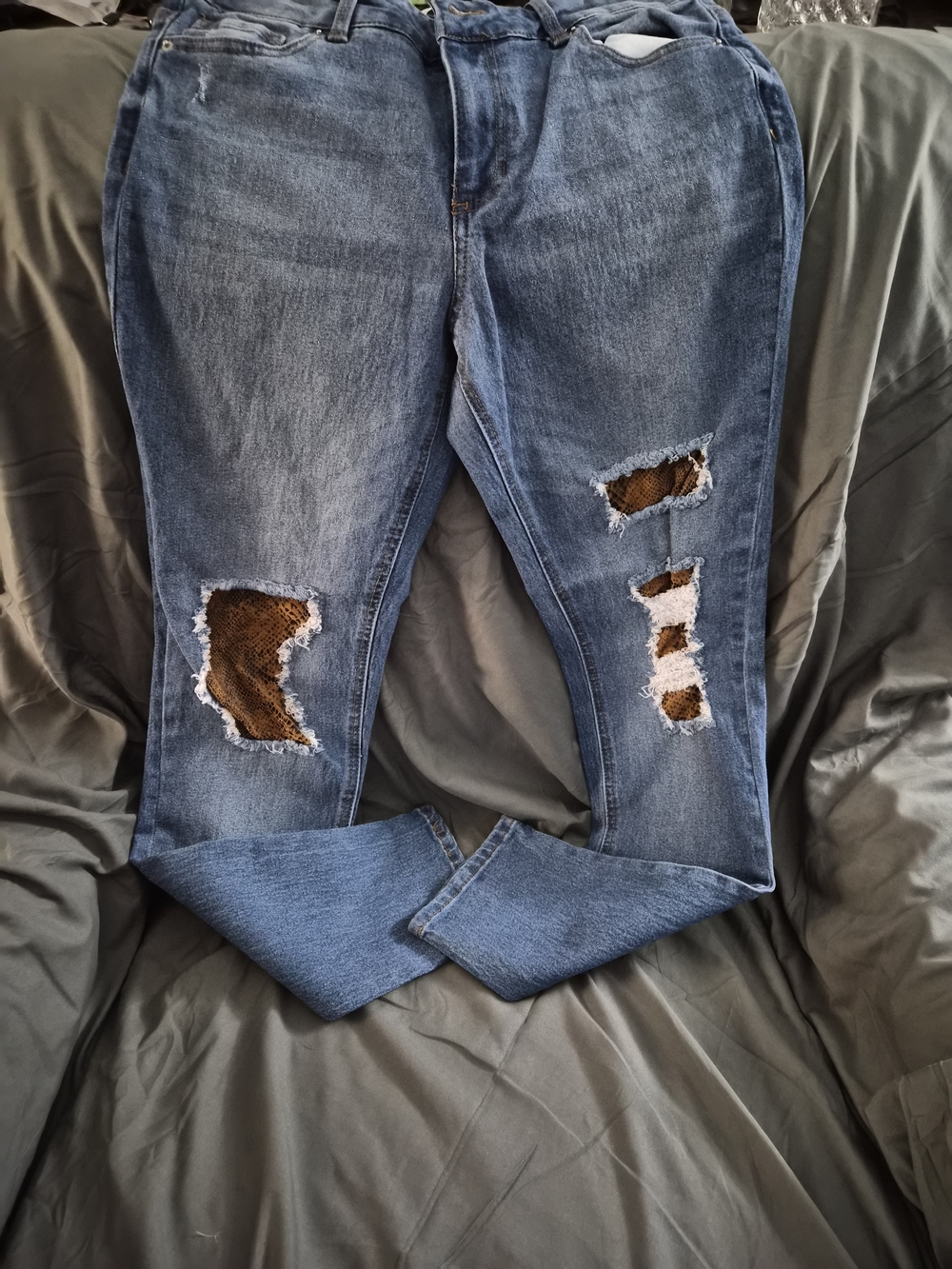 Stretch Jeans in Faded Blue with Brown Snake Patch Details